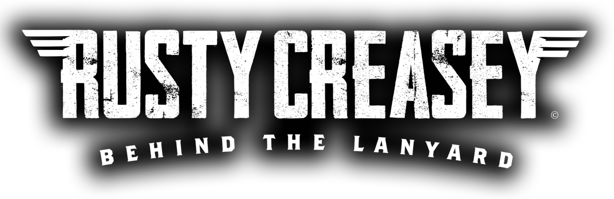 rusty creasey behind the lanyard logo